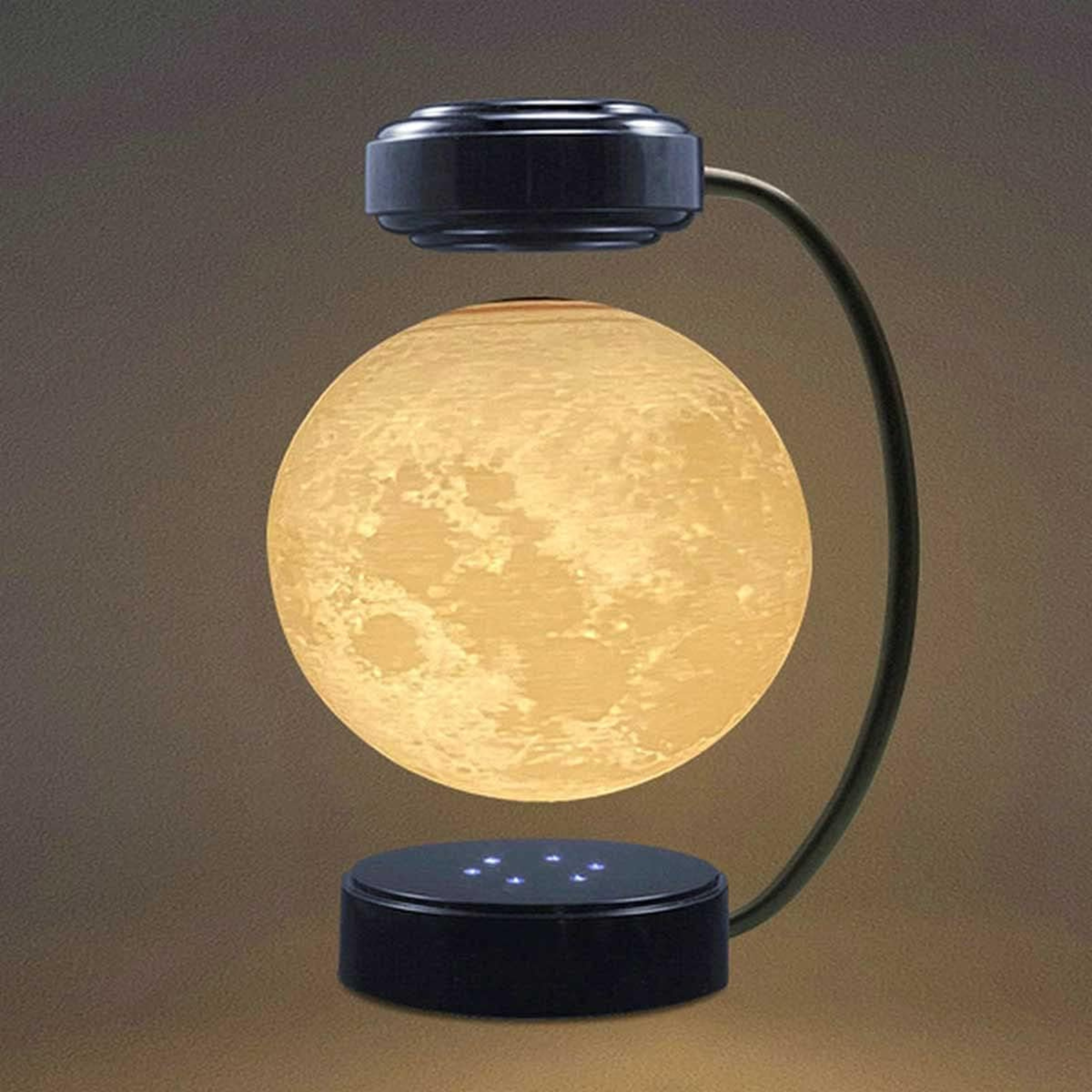 Floating magnetic moon lamp on desk