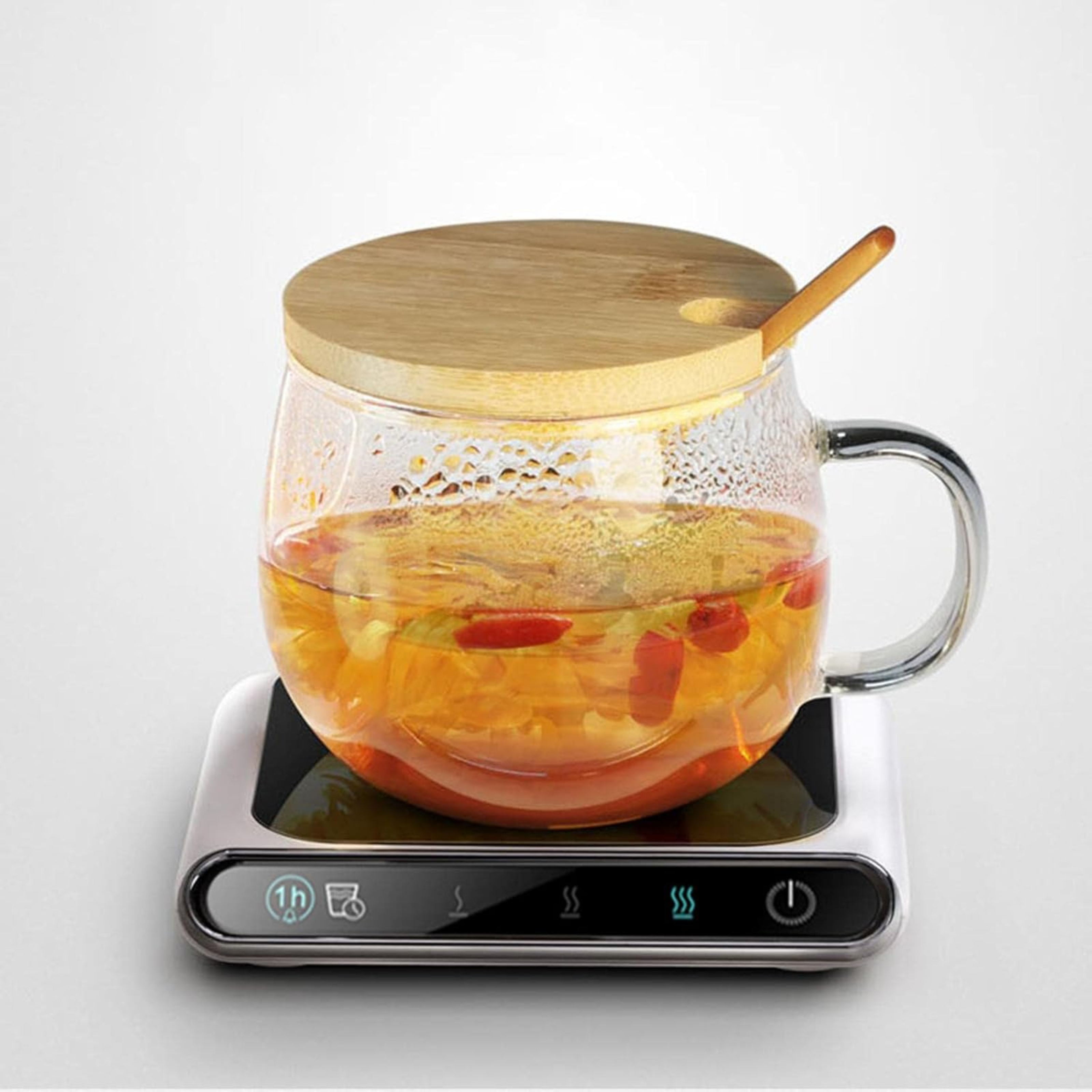 USB coffee mug warmer on desk